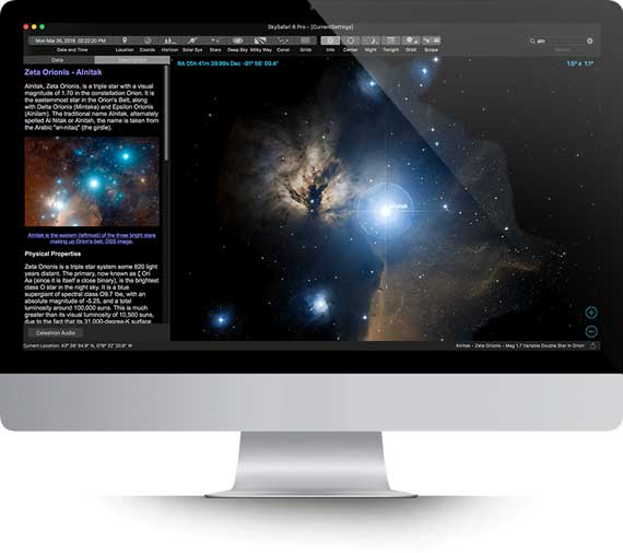 Apple iMac running Starry Night Middle School software showing a planet Saturn simulation